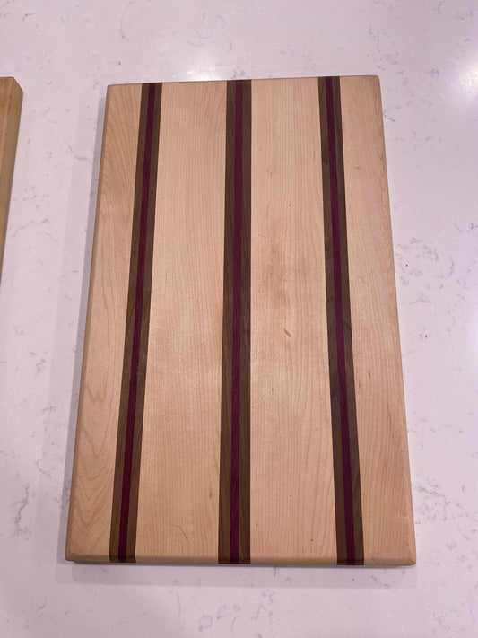 Maple with strips of black walnut and purple heart.￼￼